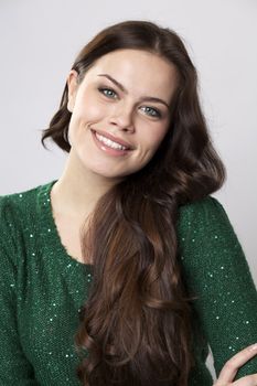 Closeup portrait of a happy young woman smiling