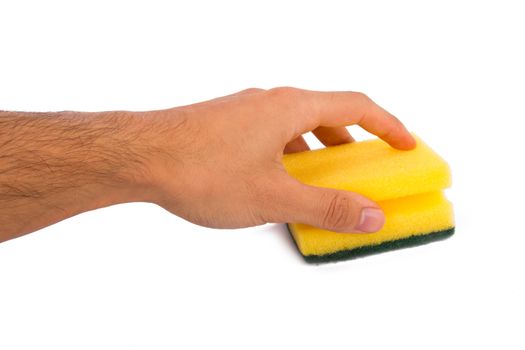 Hand holding cleaning sponge, isolated on white background.