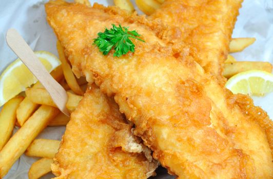 Traditional english fish and chips takeaway meal