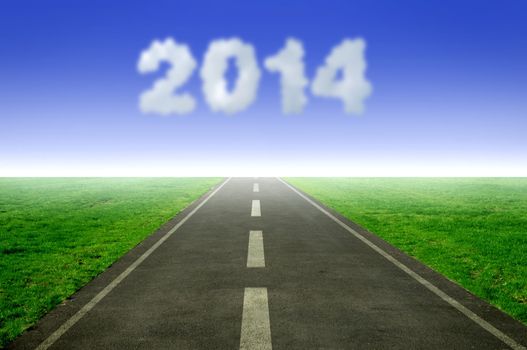 Open road leading towards 2014 in cloud form 