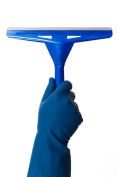 Hand in glove holding blue squeegee, back view, isolated on white background.