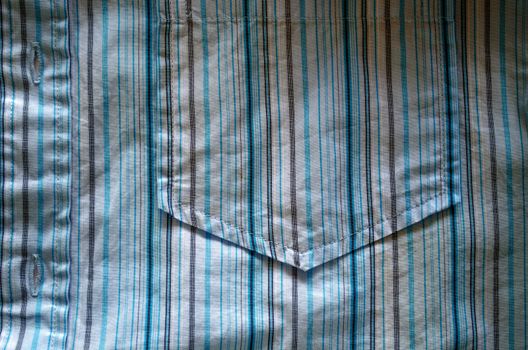 crumple shirt fabric pocket with blue lines and texture abstract background.