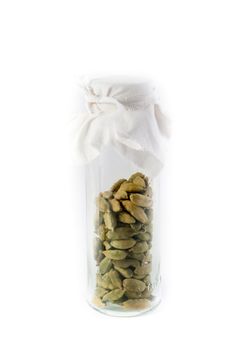 Pile of whole cardamom on white background