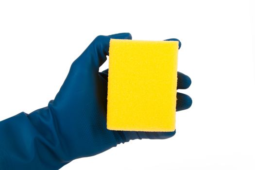 Hand with glove holding cleaning sponge, isolated on white background.