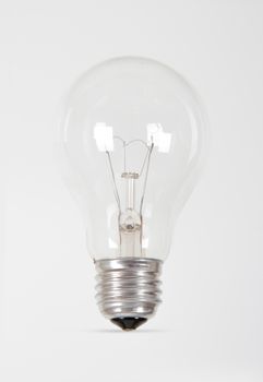 Single light bulb on white background.