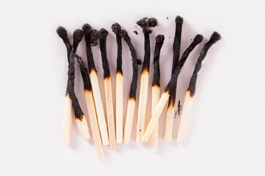 Burnt matches, isolated on white background.