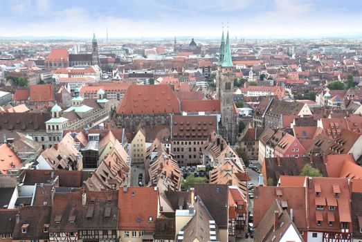 View over the old town of Nuremberg with the spires of St Sebald church and St Lorenz church, the town hall and the opera house, in Franconia, Bavaria, Germany.