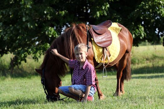 pony horse and happy boy