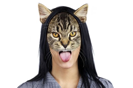 Beautiful young brunette cat woman sticking her tongue out 