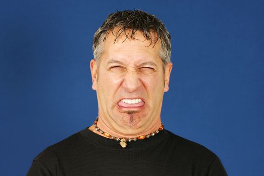 Man with funny disgusted face