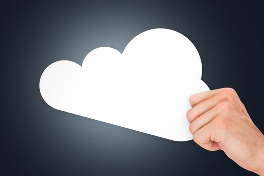 Hand holding white, empty, blank cloud technology cardboard on dark background.