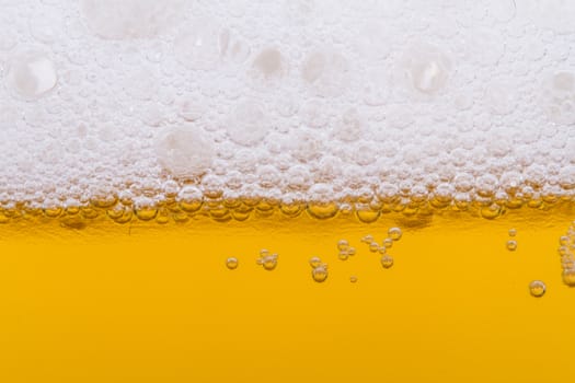 Close up, macro view of droplets, beer bubbles.