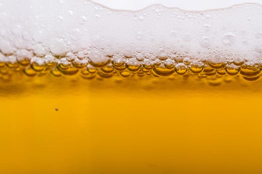 Close up, macro view of droplets, beer bubbles.