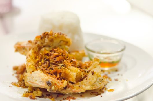 fried shrimp with chili and garlic   , served with steamed rice , asian style cuisine