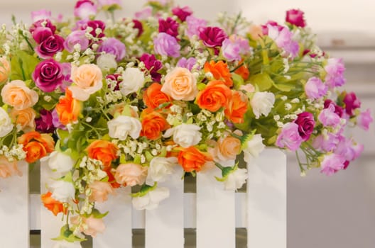 Bouquet of plastic roses and mix colorful of flowers