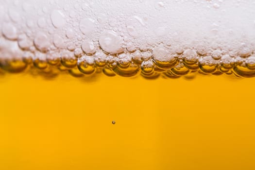Close up, macro view of droplets, beer bubbles.
