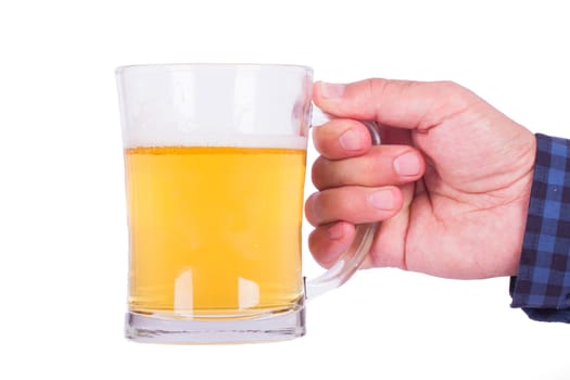 Hand holding full beer glass, isolated on white background.