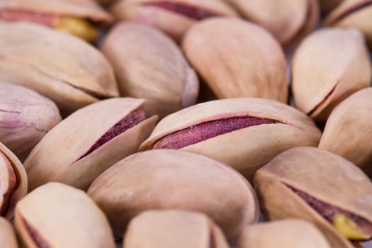 Close up to pistachio heap with depth of field.