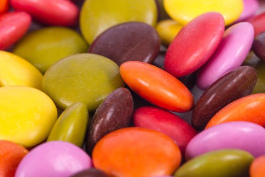 Colorful sugar candies as background.