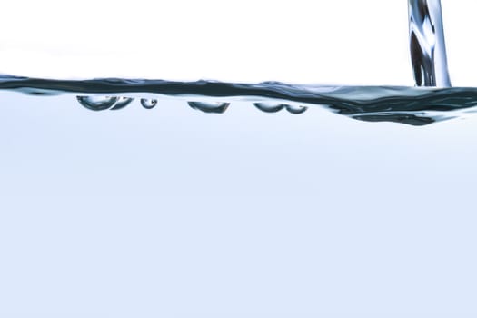 Close up view of water splash, isolated on white background.