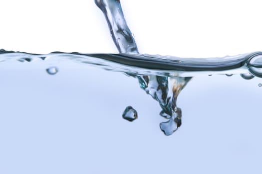 Close up view of water splash with big bubbles, isolated on white background.
