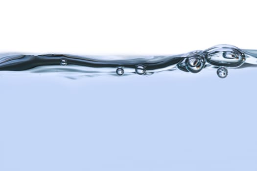Close up view of water splash with big bubbles, isolated on white background.