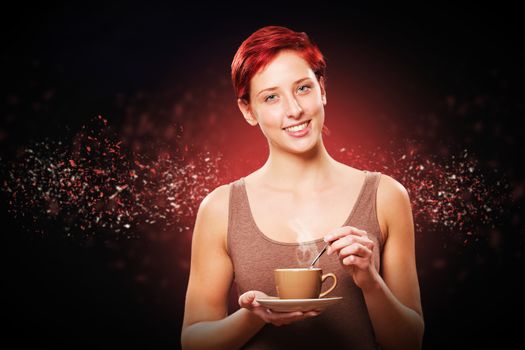 happy redhead woman with a coffee cup on black with particles