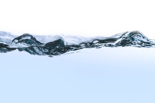 Close up view of water splash with big wave, isolated on white background.