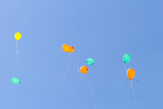 color balloons flying to the sky