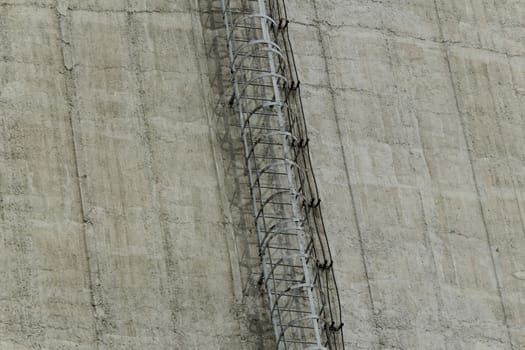 Details of a huge cooling towers with ladder of a power plant