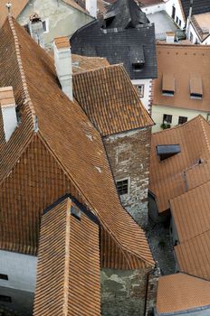 Detail of orange roof shingles at old european town.