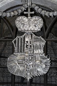 Coat of arms. Human bones at the Kutna Hora ossuary, Czech Republic.