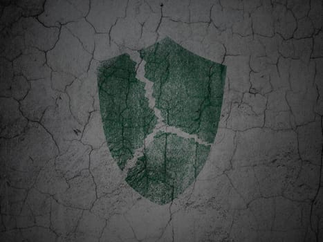 Security concept: Green Broken Shield on grunge textured concrete wall background, 3d render