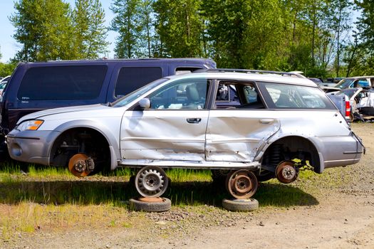 Detail of a vehicle at the auto salvage yard after a major accident collision.