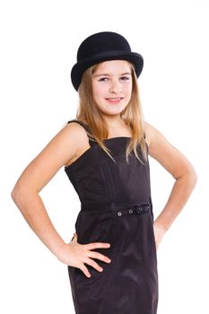 Beautiful girl wearing black dress and bowler hat in studio. Isolated on white backround.