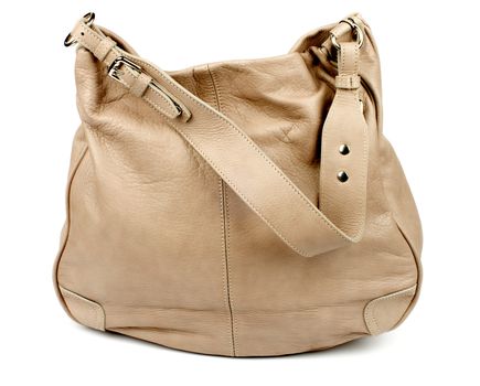 Elegant Leather Beige Women Bag with Silver Details and Long Handle isolated on white background