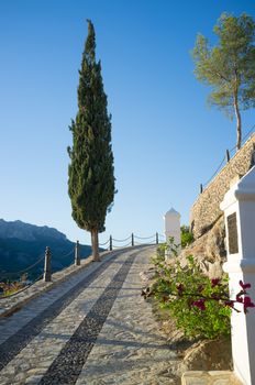 Traditioanal uphill via crucis under Mediterranean sunlight