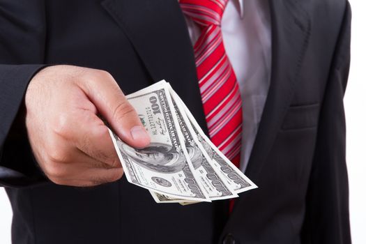 Businessman buying, selling something and giving dollars which holding.