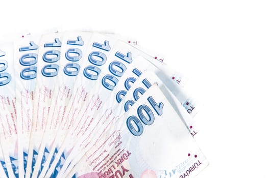 Money in a row, isolated on white background.