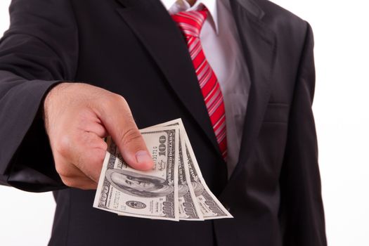 Businessman buying, selling something and giving dollars which holding.