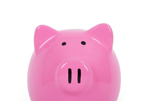 Close up view pink piggy bank, isolated on white background.