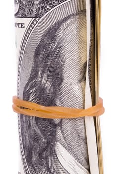 Roll of one hundred dollar banknotes, isolated on white background.