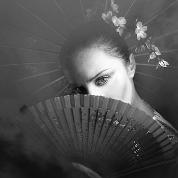 portrait of a geisha with fan