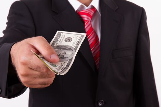 Businessman buying, selling something and giving dollars which holding.