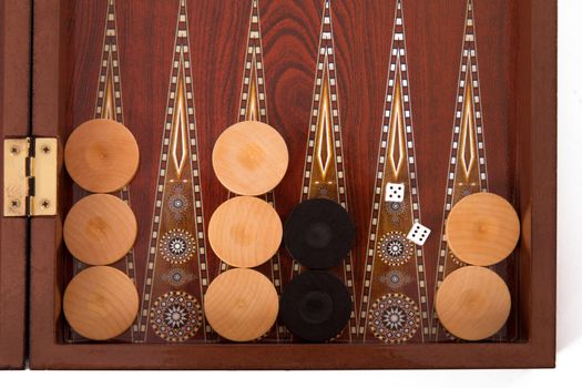 Backgammon chips and dices with five and six, top view.