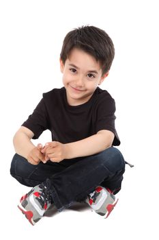 Young boy in studio with black shirt and jeans
