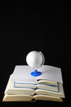 Empty Classic Book and Blank World Isolated over a Black Background