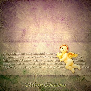 Vintage style Christmas greeting, Angel on a background of old lace and Merry Christmas in many languages