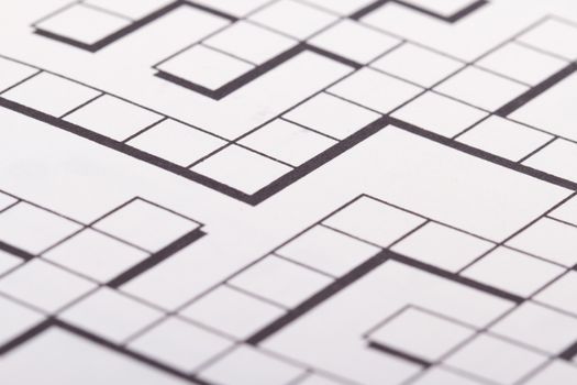 Close up of blank square crossword puzzle.