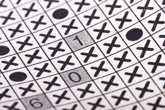 Close up of abstract crossword puzzle for solution.